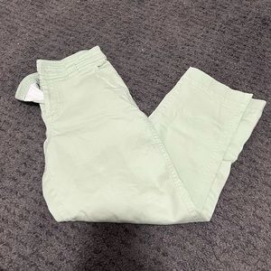 Light pastel green flare pants